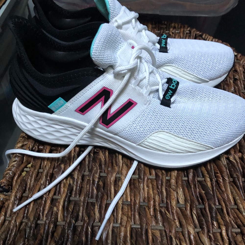 New Balance Women's White and Black Sneakers with Pink Accents